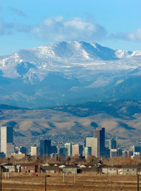 This image shows the stunning Mount Evans, one of Colorado's tallest peaks, with dramatic rocky landscapes and snow-capped views in the background. Visitors can hike to the summit to enjoy panoramic views of the surrounding mountains and valleys. The scenic drive up Mount Evans also offers access to breathtaking landscapes, making it a popular destination for outdoor adventurers and nature lovers. Whether hiking or driving, it’s a perfect spot for those seeking adventure and spectacular natural beauty near Denver.