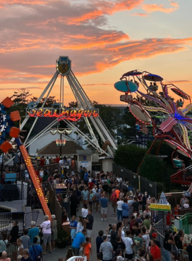 2. Visit the Funland Amusement Park This image shows that Funland Amusement Park in Rehoboth Beach is a family-friendly, nostalgic destination. It features classic rides such as the Ferris wheel, bumper cars, and various arcade games. Families and children are seen laughing, enjoying thrilling rides, and creating fun memories in this historic park that has been a local favorite for generations.