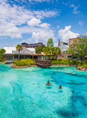 This image shows Disney Springs, an entertainment and shopping district in Orlando, offering visitors a variety of shopping, dining, and live entertainment options. With no admission fee, Disney Springs is the perfect place to explore after a day at the parks. Visitors can enjoy a wide selection of restaurants, unique Disney merchandise, and lively shows, creating a fun and vibrant atmosphere for all ages to enjoy.