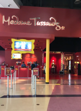 This image shows Madame Tussauds Orlando, a popular wax museum featuring lifelike statues of celebrities, historical figures, and iconic characters from pop culture. Visitors can pose with figures of famous movie stars, athletes, and musicians, making it a fun and interactive experience for all ages. The museum offers a unique opportunity to take selfies with celebrities and explore the fascinating world of wax artistry.