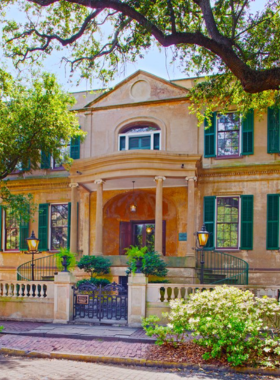 This image shows the Telfair Museums in Savannah, featuring its mix of art and history. The image includes the exterior of one of the museum’s buildings, showcasing a blend of contemporary art and historic architecture. The museum offers a range of exhibits, from classic art pieces to modern sculptures. It’s a cultural hub for art lovers who want to explore Savannah’s rich artistic heritage and enjoy the beauty of local and international art.