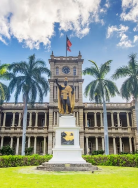 This image shows that Iolani Palace is the only royal palace in the United States, built in 1882 to serve as the residence of Hawaii’s monarchs. Located in downtown Honolulu, the palace is a symbol of Hawaii’s royal history. Visitors can tour the opulent rooms, admire the stunning architecture, and learn about the Hawaiian monarchy's past through exhibits and royal artifacts, making it a significant cultural landmark.