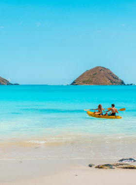 This image shows that Kailua Beach is a quiet, picturesque beach on the Windward Coast of Oahu, known for its calm turquoise waters and sandy shores. Unlike the more crowded Waikiki, Kailua offers a peaceful, family-friendly atmosphere perfect for activities like kayaking, paddleboarding, and leisurely beach walks. Surrounded by beautiful mountain views, it’s an excellent spot to relax and unwind while soaking up the natural beauty of Hawaii.