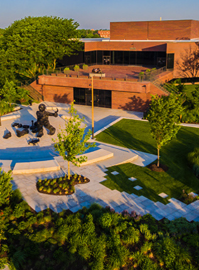 This image shows the Wichita Art Museum, Kansas' largest art museum, located in the heart of Wichita. The museum features a diverse collection of American art, ranging from historical to contemporary pieces. Visitors can enjoy exhibitions in paintings, sculptures, and photography that celebrate the creativity and history of the American artistic scene. The museum is a fantastic place for art lovers, providing educational programs and enriching the cultural landscape of Wichita.