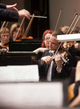 This image shows the Wichita Symphony Orchestra performing in Wichita, Kansas. With a rich history dating back to 1944, the orchestra is a cultural treasure in the city, providing high-quality classical music performances. The orchestra performs a wide range of works, from classical masterpieces to contemporary compositions. Music lovers can enjoy beautiful orchestral music in an elegant setting, making it a must-see event for anyone visiting Wichita looking to experience local culture.