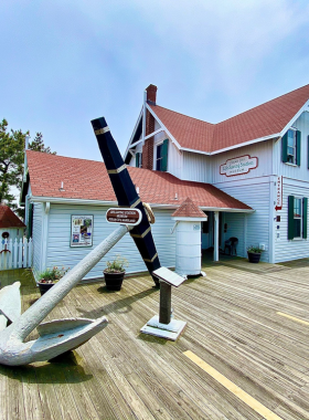 This image shows the Ocean City Life-Saving Station Museum, a historic site that preserves the rich maritime history of the town. The museum is housed in a historic building with exhibits displaying maritime artifacts, old photographs, and displays about life-saving efforts along the coastline. Visitors explore the history of the brave crews who risked their lives to save shipwrecked sailors. It’s an educational and fascinating stop that offers insights into the town’s seafaring past and its dedication to saving lives.