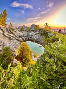 This image shows the stunning view from Sunset Rock on Mackinac Island, where visitors can watch the sun set over Lake Huron. The scenic viewpoint offers breathtaking panoramic views, with vibrant colors painting the sky as the sun dips below the horizon. It’s one of the best spots on the island to relax and enjoy nature’s beauty at its finest. Sunset Rock provides a peaceful and unforgettable experience for visitors looking to connect with the island’s natural splendor.