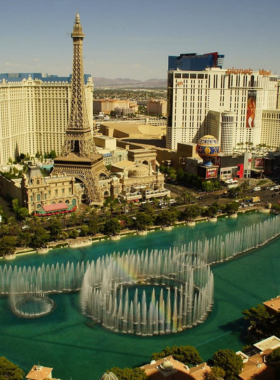 This image shows that the Bellagio Fountains are a breathtaking sight on the Las Vegas Strip. The fountains are choreographed to dance in sync with music and dramatic lighting, creating a mesmerizing water show. The fountains’ graceful movements captivate audiences with water jets soaring high into the air and coming back down in intricate patterns. Located in front of the Bellagio Hotel, it’s a free-to-watch show that attracts millions of visitors each year. At night, the lighting adds an extra magical touch to the already impressive spectacle, making it a memorable experience for tourists.