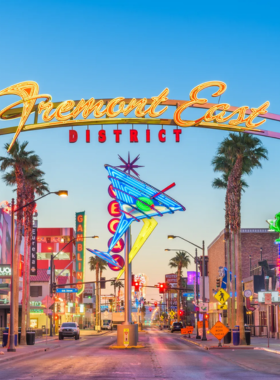 This image shows that Fremont Street, located in downtown Las Vegas, is a throwback to the old-school Vegas, featuring neon lights, vintage signs, and classic casinos. It’s home to the Fremont Street Experience, an interactive pedestrian mall with a giant LED canopy overhead, showing vibrant light shows that bring the street to life at night. Fremont Street is also known for its zip-line adventure, where visitors can fly above the crowd while enjoying the old Vegas charm. The street offers a blend of nostalgia and modern-day excitement, making it a unique place to explore in Las Vegas.