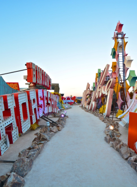 This image shows that the Neon Museum in Las Vegas is home to a collection of iconic neon signs from the city’s past. The museum, also known as the Neon Boneyard, preserves vintage signs that once lit up the Las Vegas skyline. Visitors can explore the history of the city through these signs, many of which represent the golden age of Las Vegas. It’s a great place for history enthusiasts and photographers, offering an insight into the evolution of the city’s entertainment culture. The museum's outdoor exhibits are a unique look at the Las Vegas of yesteryear.