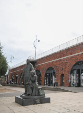 This image shows the Hotwalls Studios in Portsmouth, a creative hub for local artists. The studios are housed in a historic building that was once part of the city’s fortifications. Today, it’s a space where visitors can explore art exhibitions, meet local artists, and purchase original artwork. The studios offer a unique and vibrant atmosphere for those interested in art and creativity. It’s a place where the past meets the present, offering an inspiring experience for art lovers.